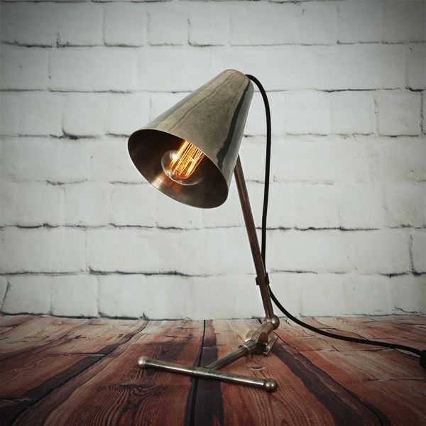 The Comoro Art Deco table lamp is a sophisticated table lamp from Mullan Lighting that ill produce a warm light to add a visual comfort to a space. 