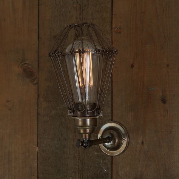 This industrial cage wall light from Mullan Lighting oozes a vintage charm and decorative features. 