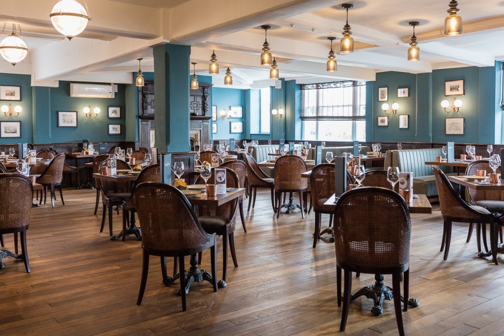This British coastal restaurant features a number of our brass lights