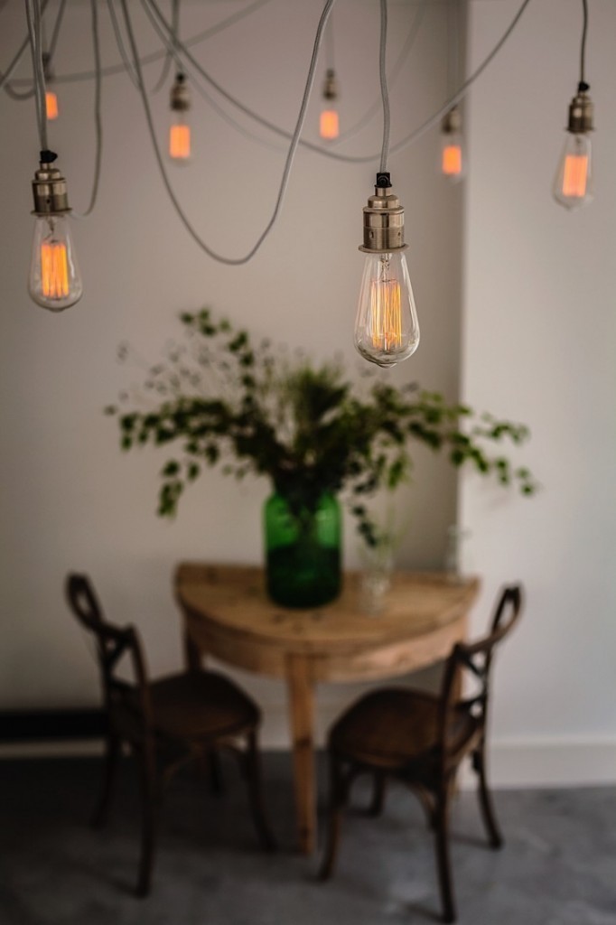 Simple yet effective, the Lome cluster pendants from Mullan Lighting add an understated beauty to this kitchen space