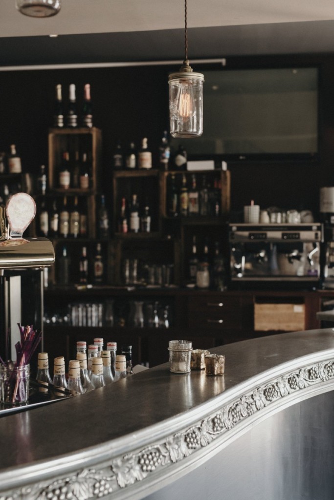 Jam Jar cluster pendants are a unique lighting feature from Mullan Lighting that are suspended in this bar and restaurant