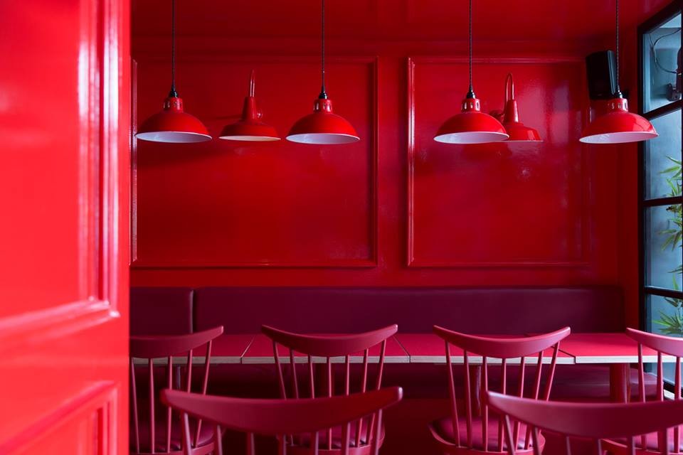 Osson pendants powder-coated in red from Mullan Lighting bring the colour scheme of this Asian restaurant together