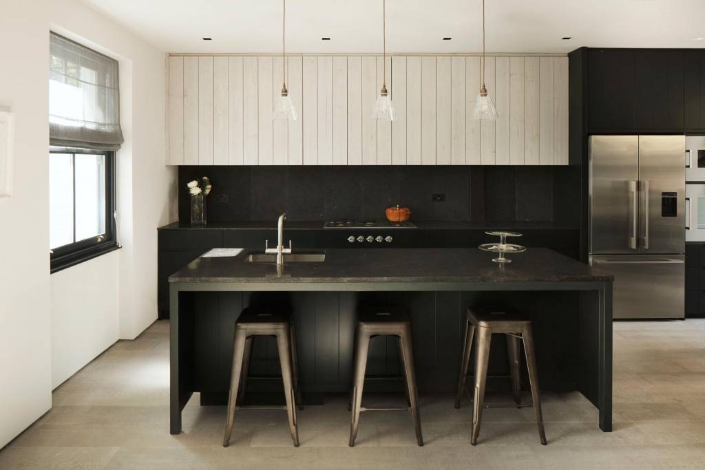 Our Lyx pendant lights delicately hang above this kitchen island 