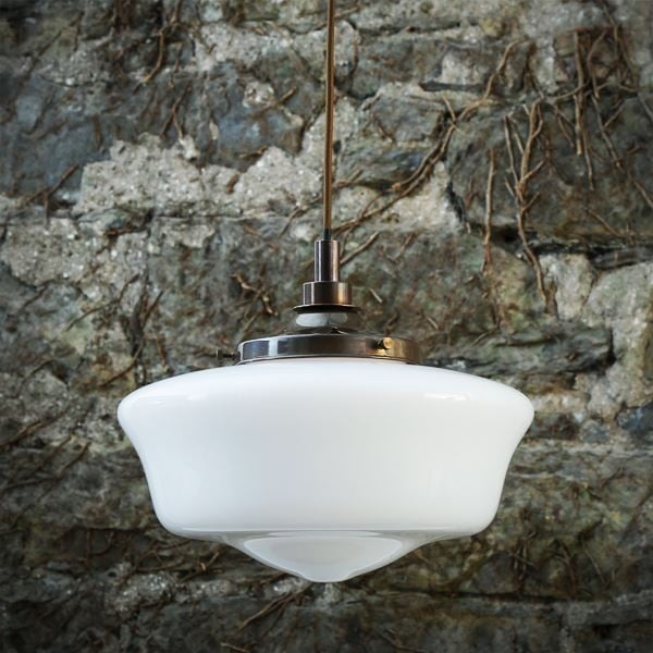 Boasting a traditional design, the Anath pendant light will diffuse warm light in your home. Designed to accommodate a variety of spaces and ceiling heights, this schoolhouse pendant light is a great addition to any foyer, above a kitchen island or even in a bathroom. 