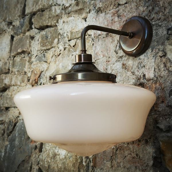 Aesthetically pleasing, the Anath wall light is a great way to add gleaming shine to your home. This glass wall light would look great if installed in either side of a bathroom mirror to provide a soft diffused light. Its open bottom shape allows for a subtle floodlight effect.