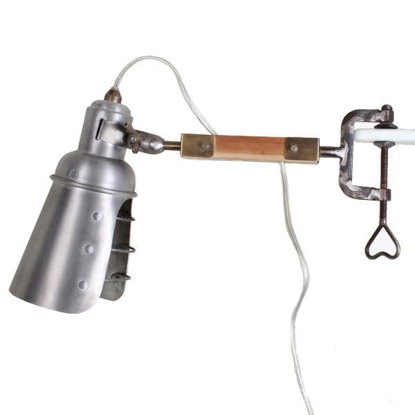 Light up a workspace or seating area with Arcadia industrial wall light with clamp. This adjustable wall light can be clamped to any shelf or ledge make it a valuable asset to any studio or office.