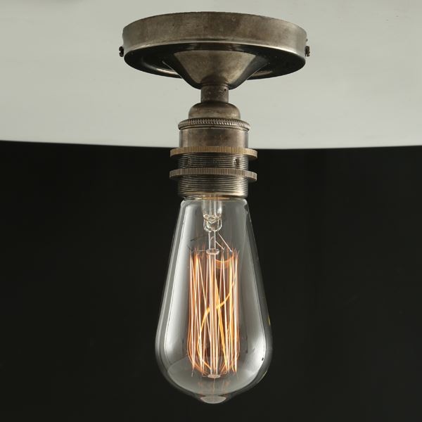 The Bexter vintage flush ceiling light will illuminate any space with eye-catching brilliance. Designed to showcase the warmth of Edison-style filament bulbs, this vintage ceiling light adds interest to entryways, kitchens, and dining rooms.