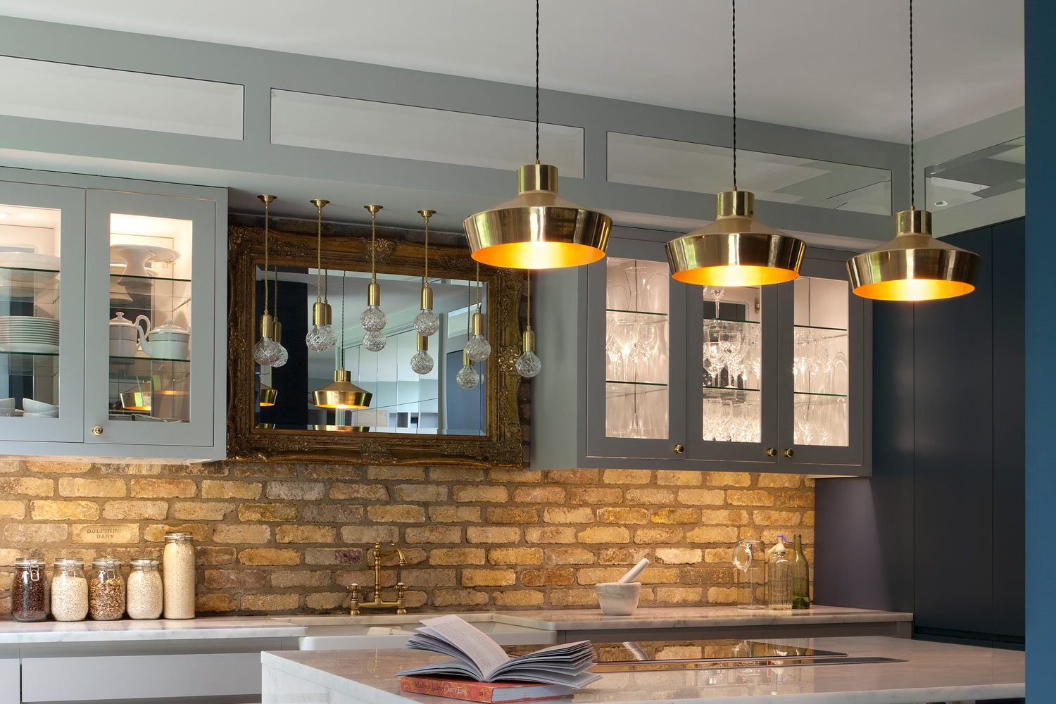 Brass kitchen lighting is making a comeback