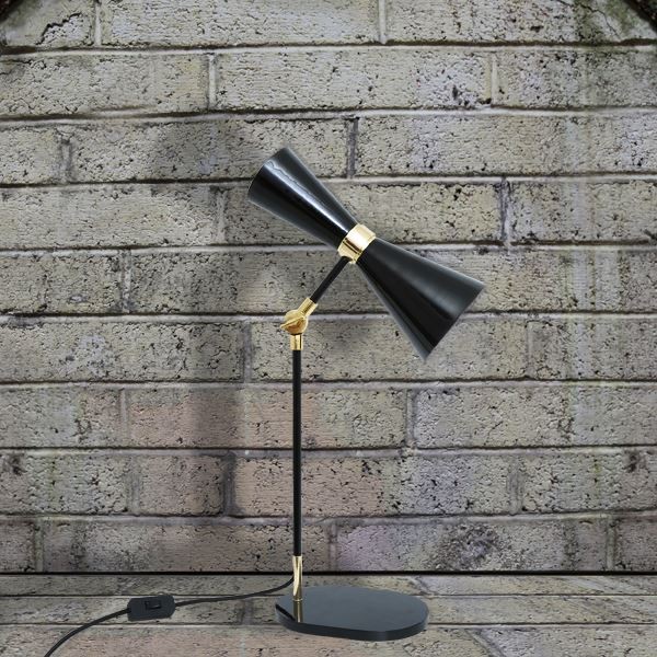 Inspired by the clean lines and sophistication of Mid-Century design, the Cairo table lamp is a chic addition to any room. Its slim profile and cone-shaped shade make it an uncommon accent for any desk, dresser or night stand.
