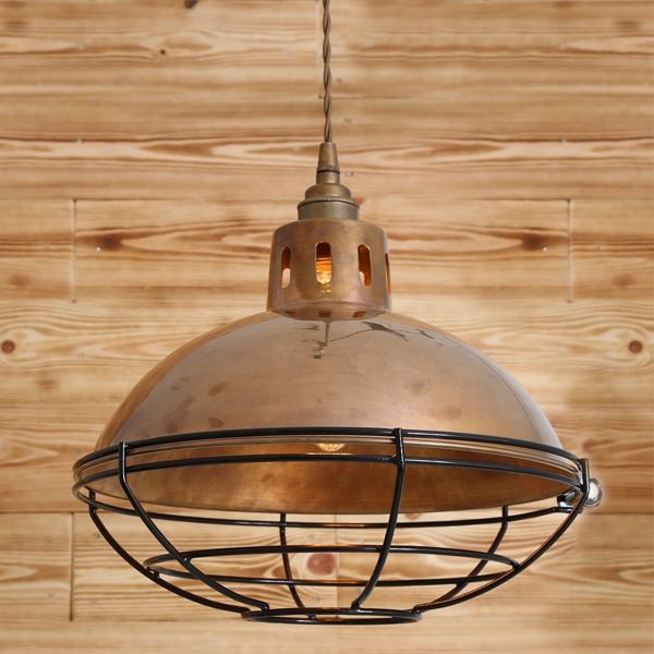 With an industrial look, the Chester cage lamp factory light is a modern version of traditional industrial factory pendants. This contemporary pendant light is a perfect addition to interiors looking to add an industrial flair to their space.