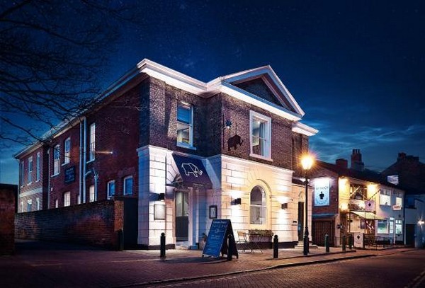 Prismatic glass shades create a diffused glow at this tavern in Colchester, England