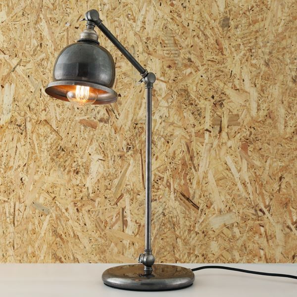 The Dale industrial table lamp adds a touch of crafted sophistication to minimalist or industrial interiors and provides warm and inviting illumination.