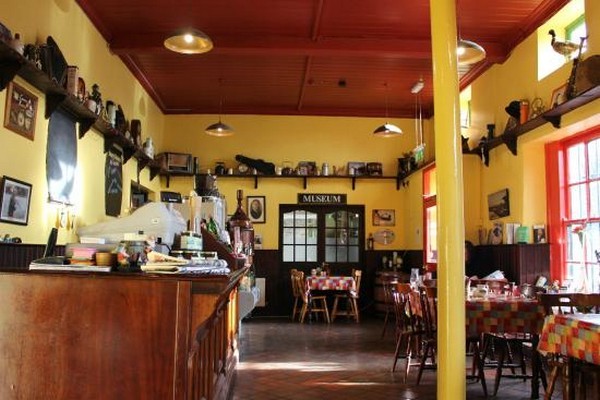 Industrial pendant lights from Mullan Lighting are suspended in the restaurant are of the Kilbeggan Distillery.