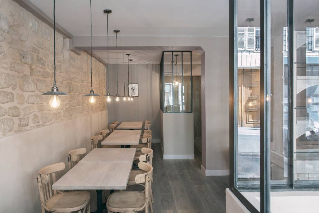 Our Reznor pendants illuminate this rustic Parisian restaurant