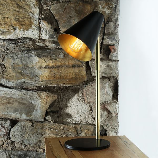 With a striking look, the Lusaka table lamp easily revives any room or home office with its charming design. The contemporary styling of this desk lamp makes it a great addition to any home or office.