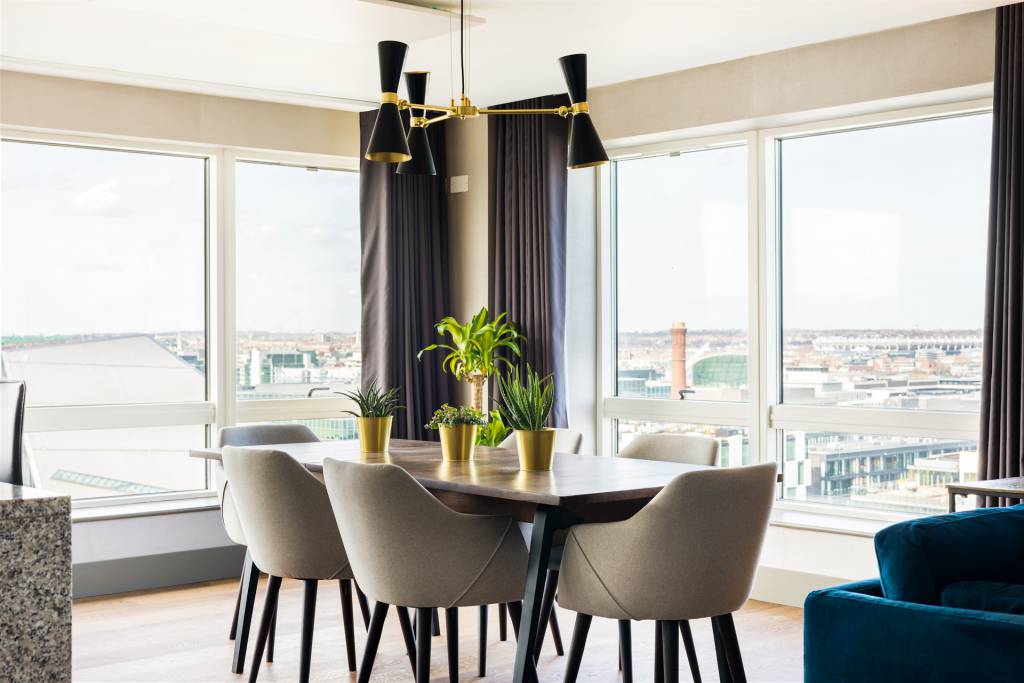 This mid-century modern chandelier creates a vocal point in the dining area