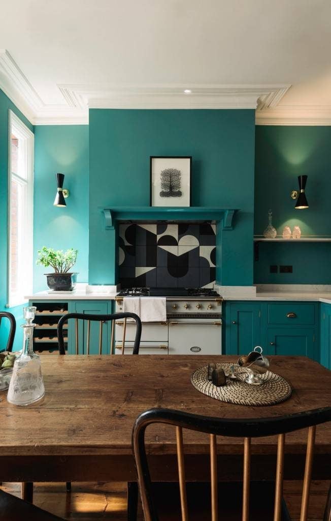 Mid-century modern Shaker kitchen with our Cairo wall lights