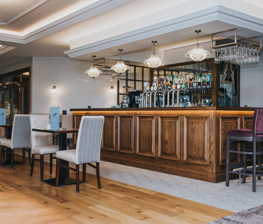 Four of our Essence double prismatic pendant lights above the Pitchers bar