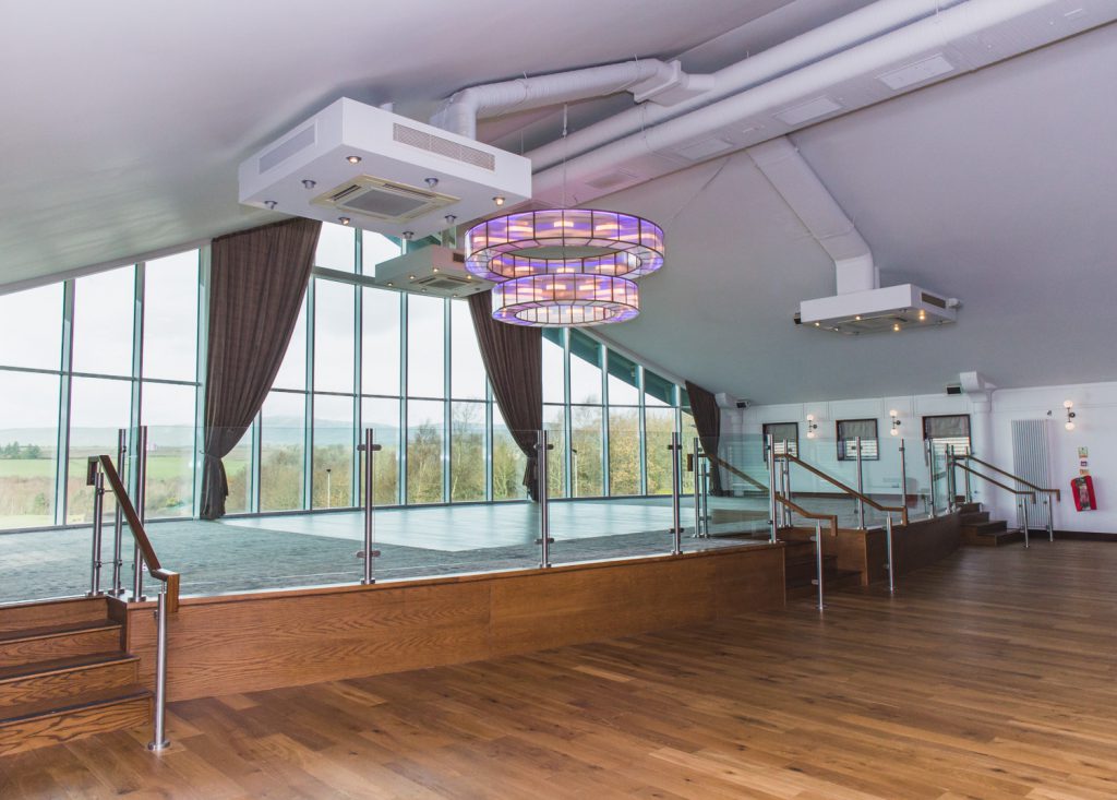 The double ring chandelier installed above the main stage area of the Foyle Golf Centre