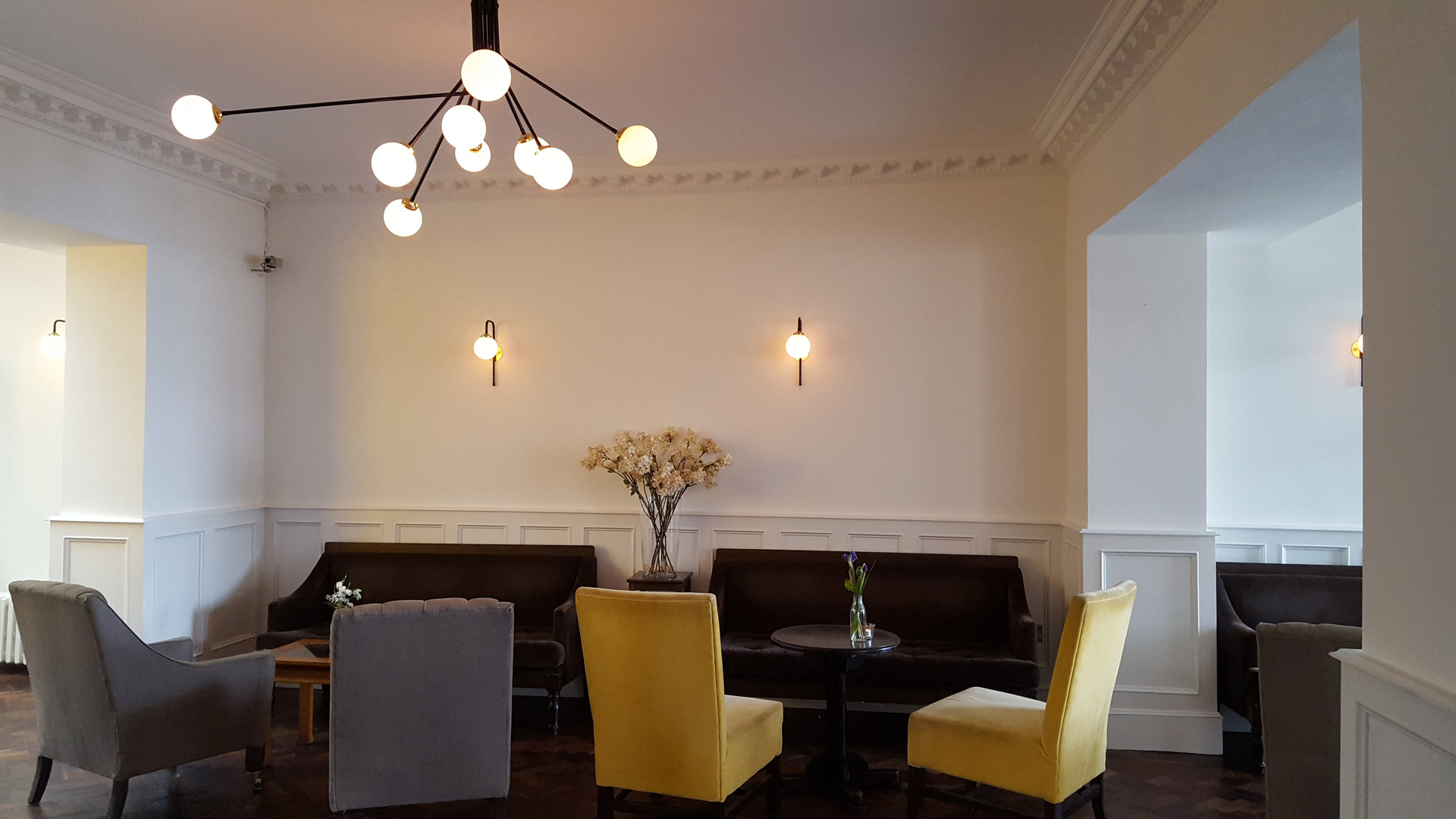 Bespoke wall lights and chandelier at Haddington House