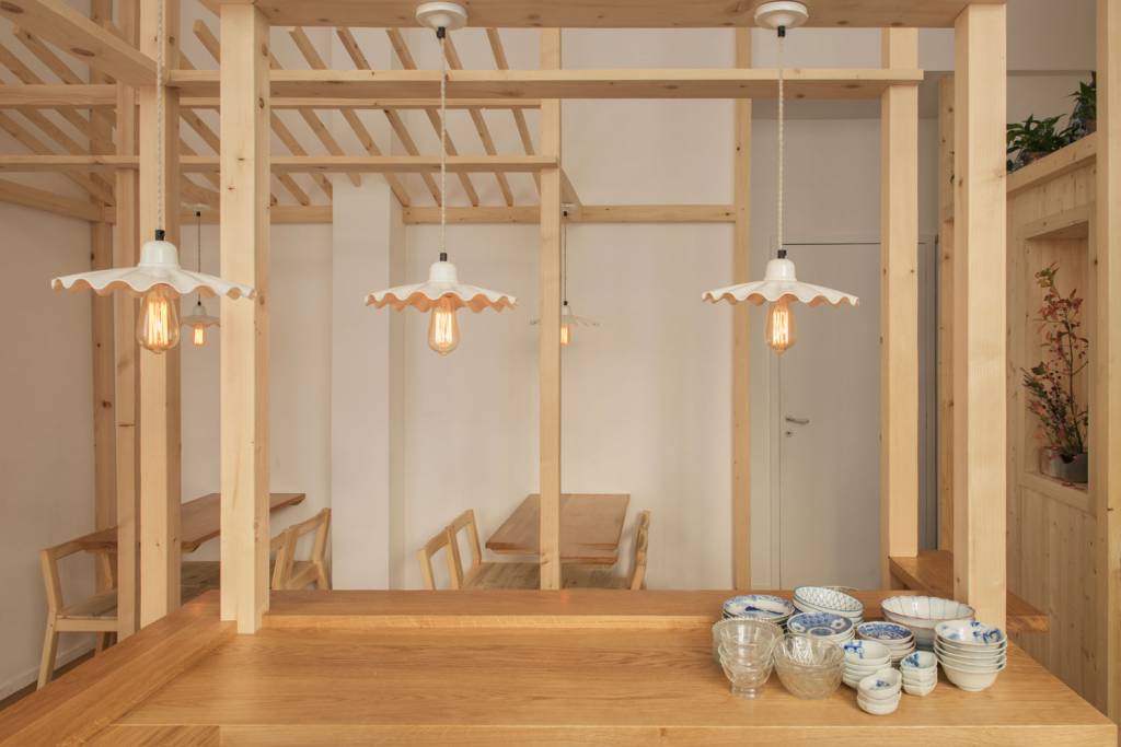 Our Ardle pendant lights complement the soft wooden décor of Taeko restaurant, Paris. 