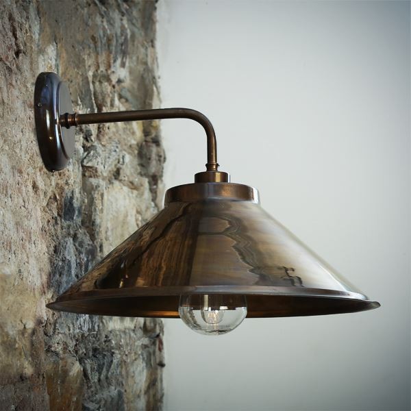 With an industrial look, the Nerissa wall light makes a bold style statement in any home. This weatherproof light is a great way to light up a porch, patios or positioned outside your front door or garage to warmly greet your guests. It also can be used in tight spaces, such as nooks and attic rooms.