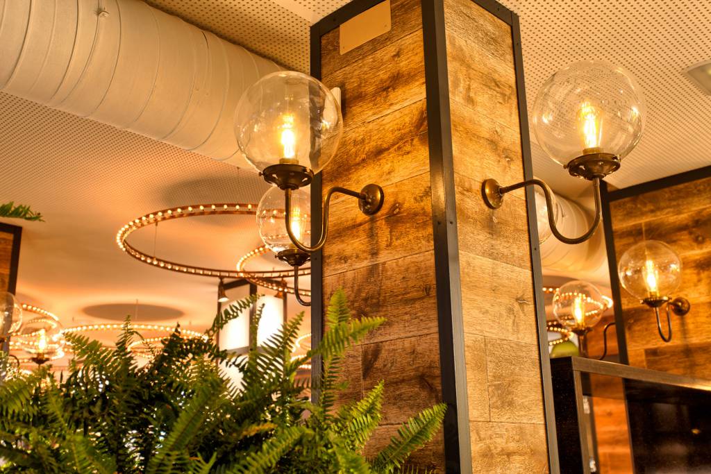 Our Riad clear globe wall lights illuminate NOTO Restaurant