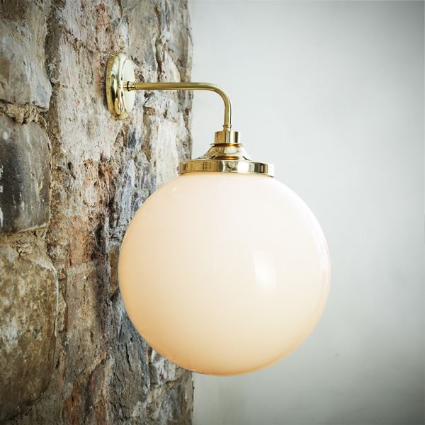 Boasting a unique globe design, the Pelagia wall light provides diffused ambient light. This globe wall light is a perfect addition in a foyer, hallway or in a bathroom, and can be positioned up or down for a variety of lighting options.