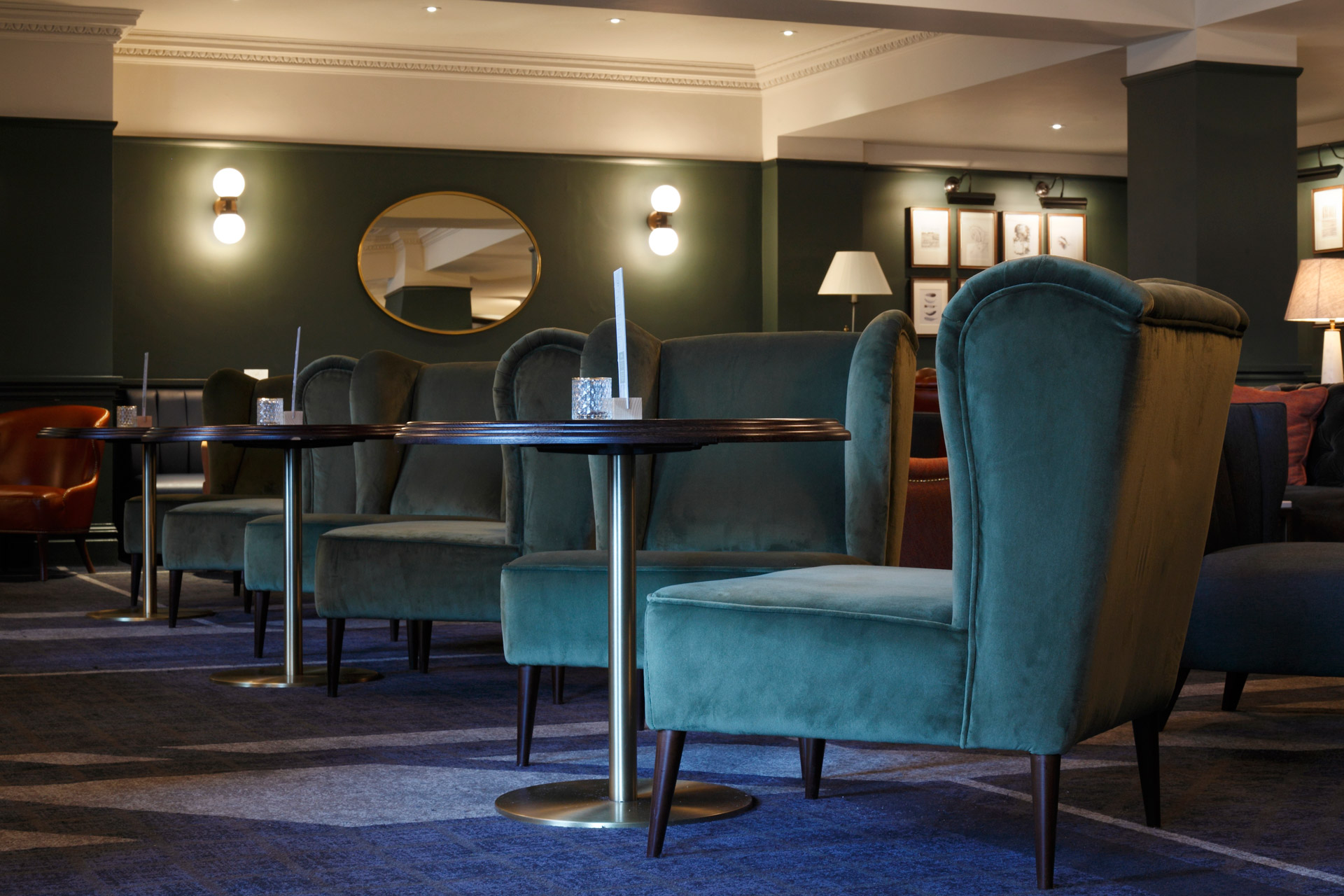 Bespoke light fixtures add to the relaxed atmosphere at the Hilton Puckrup Hall