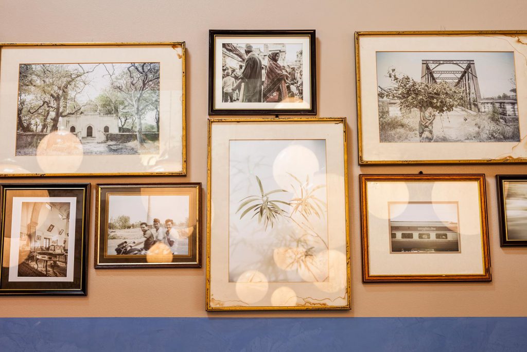 Pictures from the chef's home in India adorn the walls of the restaurant