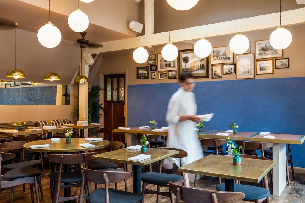 Our gentry opal glass globe pendants feature in this Indian restaurant in London