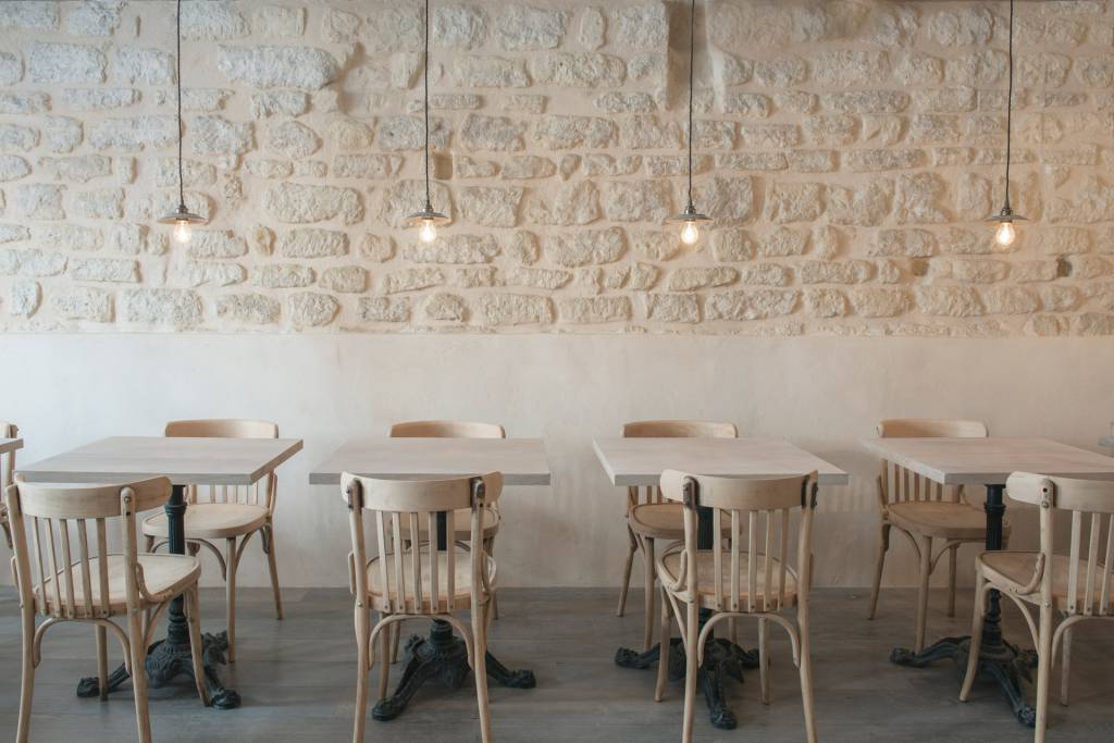 Our Reznor pendants illuminate this rustic Parisian restaurant