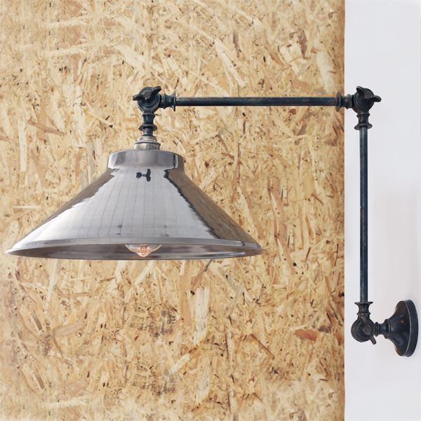 The Rio adjustable wall light oozes an authentic charm 