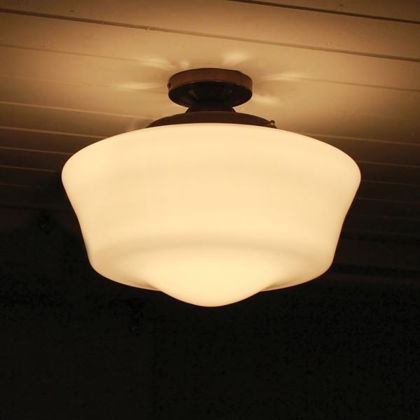 With a clean design, the Schoolhouse ceiling light is widely specified to interiors where traditional architecture requires a sympathetic lighting. This contemporary flush ceiling light is a great addition to any foyer, above a kitchen island or in a bathroom.