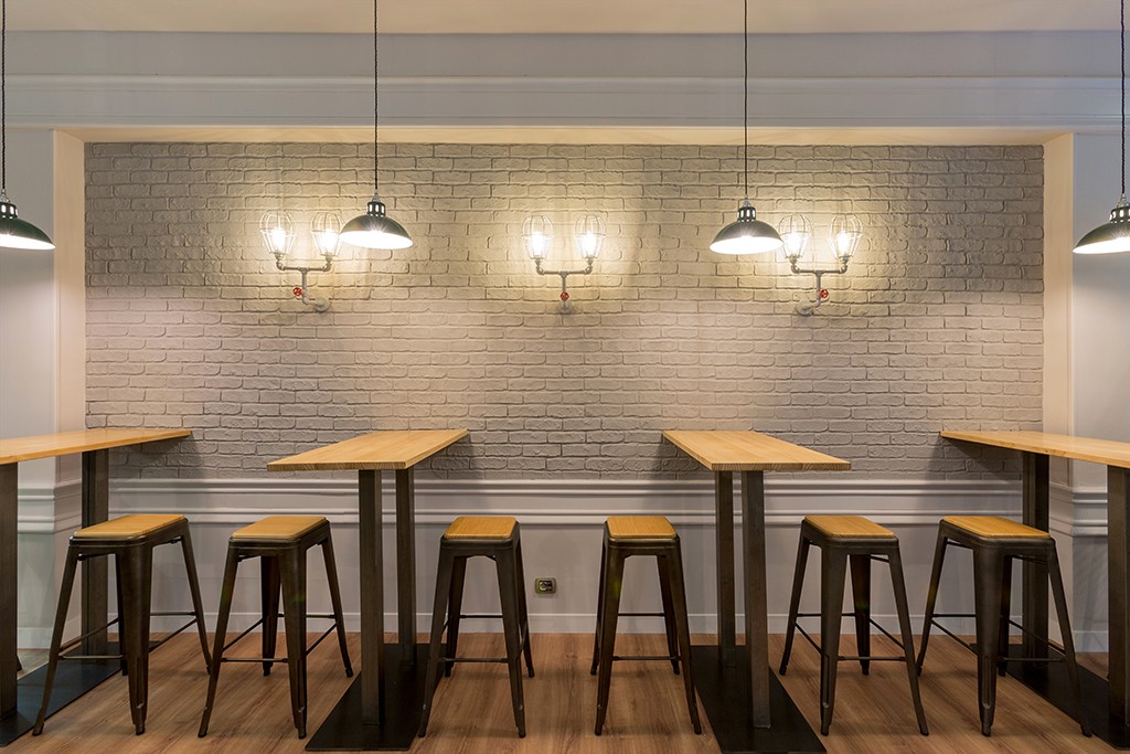 Our Osson factory pendants provide a visual warmth in Cafetaria Taloaska