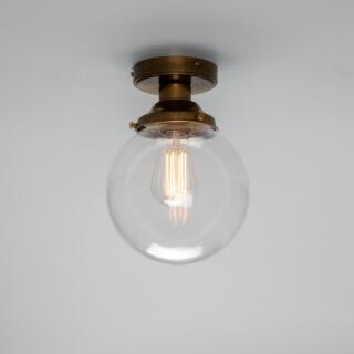 Riad Clear Glass Globe Flush Ceiling Light 7.75", Antique Brass