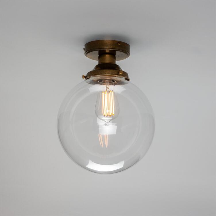 Riad Clear Glass Globe Flush Ceiling Light 7.5", Antique Brass