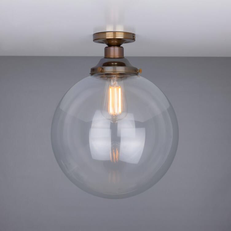 Riad Clear Glass Globe Flush Ceiling Light 30cm, Antique Brass