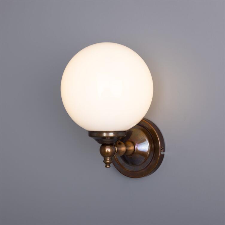 Cloghan Traditional Opal Glass Globe Wall Sconce, Antique Brass