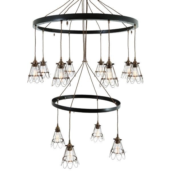 Create a sleek, bold look in your home using the Praia two-tier chandelier. This contemporary chandelier with two black rings is perfect for rustic style restaurants and vintage chic kitchens and dining rooms.