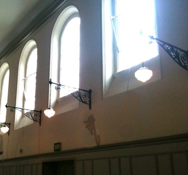 Stanbrook Abbey function room was previously an English Monastery and features our vintage wall lights 