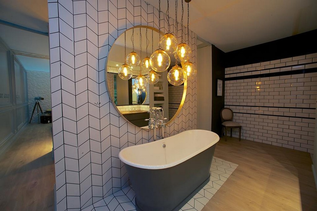 Our Laguna pendant lights are clustered together to create a unique lighting effect in this bathroom