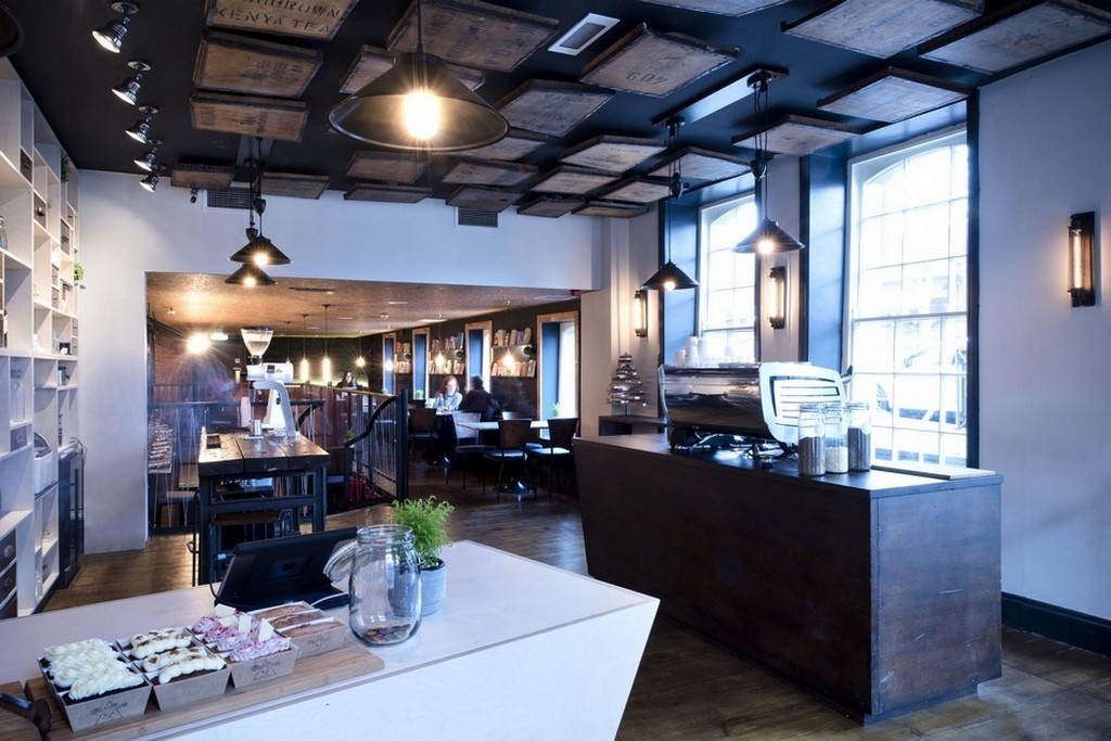 Pendant lighting from Mullan Lighting features in this restaurant space and helps create the desired ambiance for diners.
