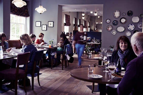 Essence pendant lights from Mullan Lighting are suspended in the dining space of The Church Street Tavern 