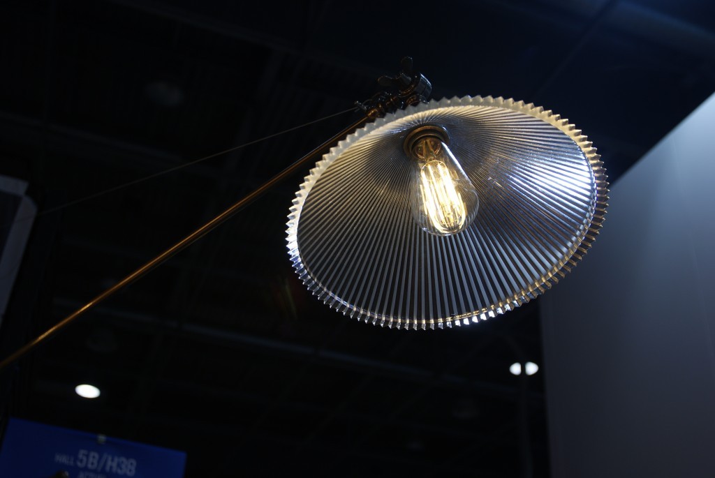 This NYX adjustable coolie wall light from Mullan Lighting creates a welcoming, diffused glow.