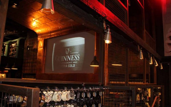 Light fixtures from Mullan Lighting add to the historic flair of Guinness Storehouse Dublin