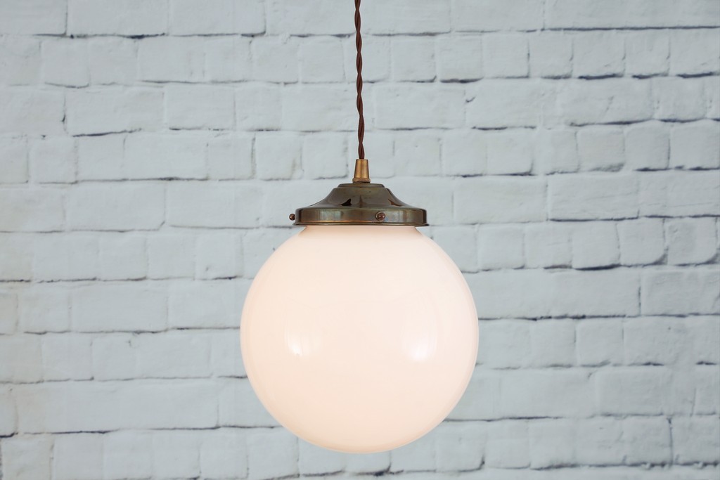 Fill your home with a warm glow with the Gentry 20cm Opal Globe Pendant Light.