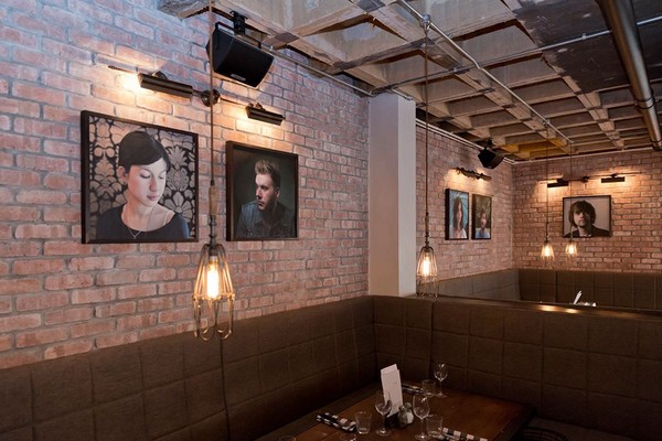 Industrial light fixtures from Mullan Lighting illuminate The Artisian Bar in Manchester