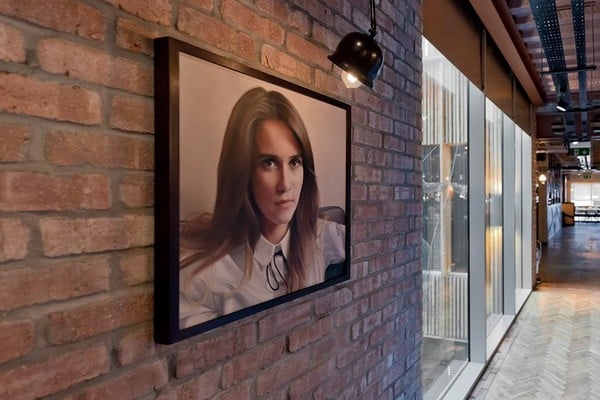 Our picture lights help highlight the bold choice of artwork in The Artisian Café Bar located in Manchester 