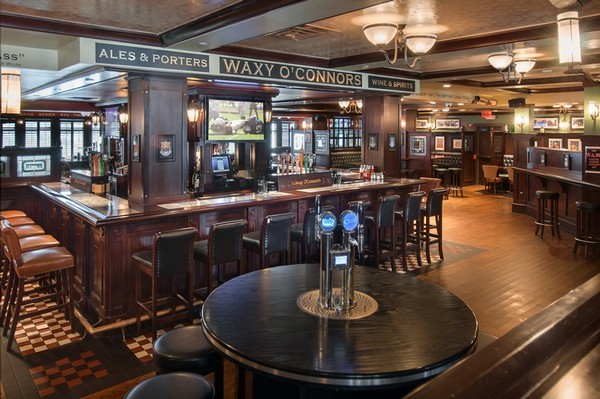 Mullan Lighting created a series of decorative lighting pieces for Waxy O'Connor's Irish Pub & Restaurant.